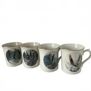 Set of four Lenox Eagle Conservation Northern Heritage porcelain mugs.